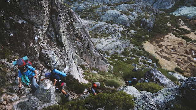 The Ultimate Trekking Essentials List, people trekking in a valley